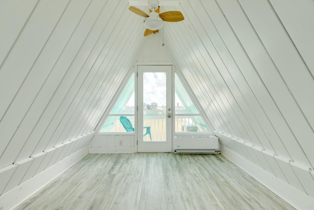 312 Angel Wing, Surfside Beach, TX 77541 - additional living space featuring a ceiling fan, wood finished floors, a water view, and wooden walls