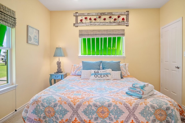 122 Ocean View Dr, Crystal Beach, TX 77650 - carpeted bedroom with baseboards