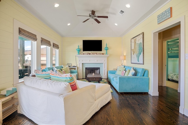122 Ocean View Dr, Crystal Beach, TX 77650 - living area featuring a ceiling fan, lofted ceiling, dark wood-style floors, a fireplace, and recessed lighting