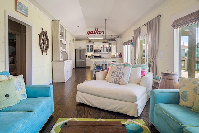 122 Ocean View Dr, Crystal Beach, TX 77650 - living room featuring lofted ceiling, healthy amount of natural light, and dark wood-style flooring