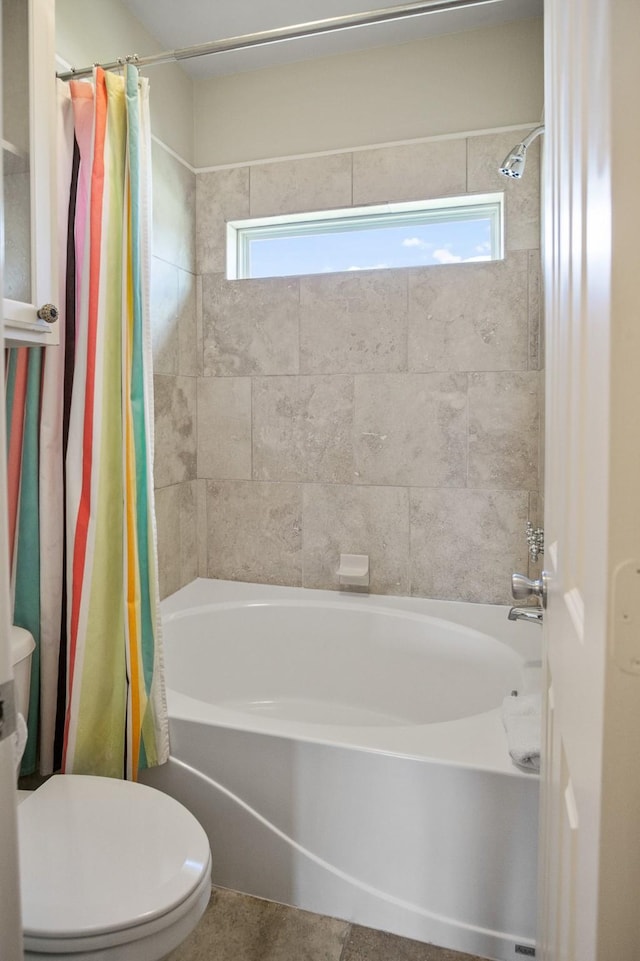 bathroom with shower / bathtub combination with curtain, toilet, and plenty of natural light