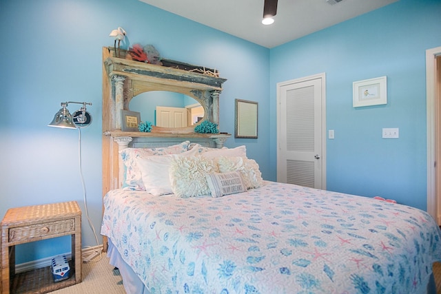 carpeted bedroom with ceiling fan