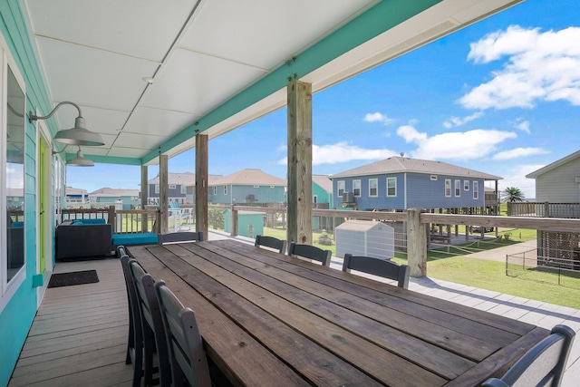 122 Ocean View Dr, Crystal Beach, TX 77650 - wooden terrace with a residential view and a yard