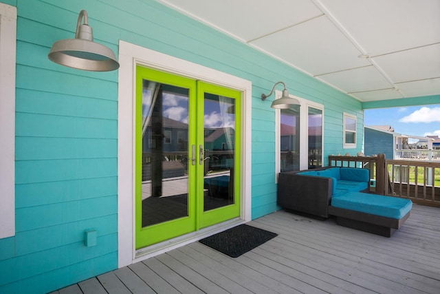 122 Ocean View Dr, Crystal Beach, TX 77650 - wooden deck with french doors