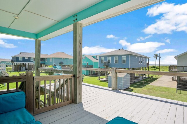 122 Ocean View Dr, Crystal Beach, TX 77650 - deck with a residential view and a yard