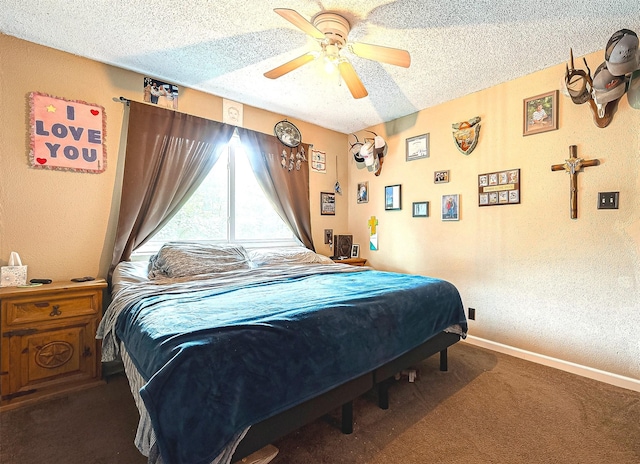 carpeted bedroom with a textured ceiling and ceiling fan