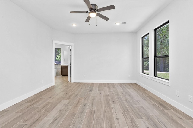 651 Paradise Dr, Coldspring, TX 77331 - spare room featuring light wood-type flooring, a ceiling fan, baseboards, and recessed lighting