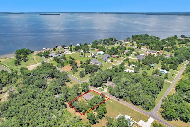 651 Paradise Dr, Coldspring, TX 77331 - aerial view of property's location featuring a large body of water and property boundaries highlighted