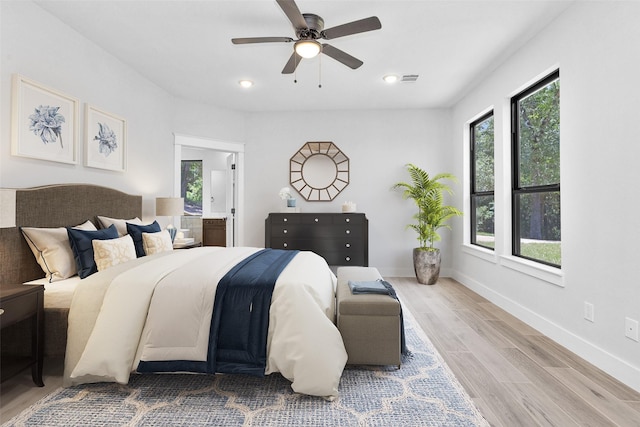 651 Paradise Dr, Coldspring, TX 77331 - bedroom featuring wood finished floors, baseboards, recessed lighting, and ceiling fan