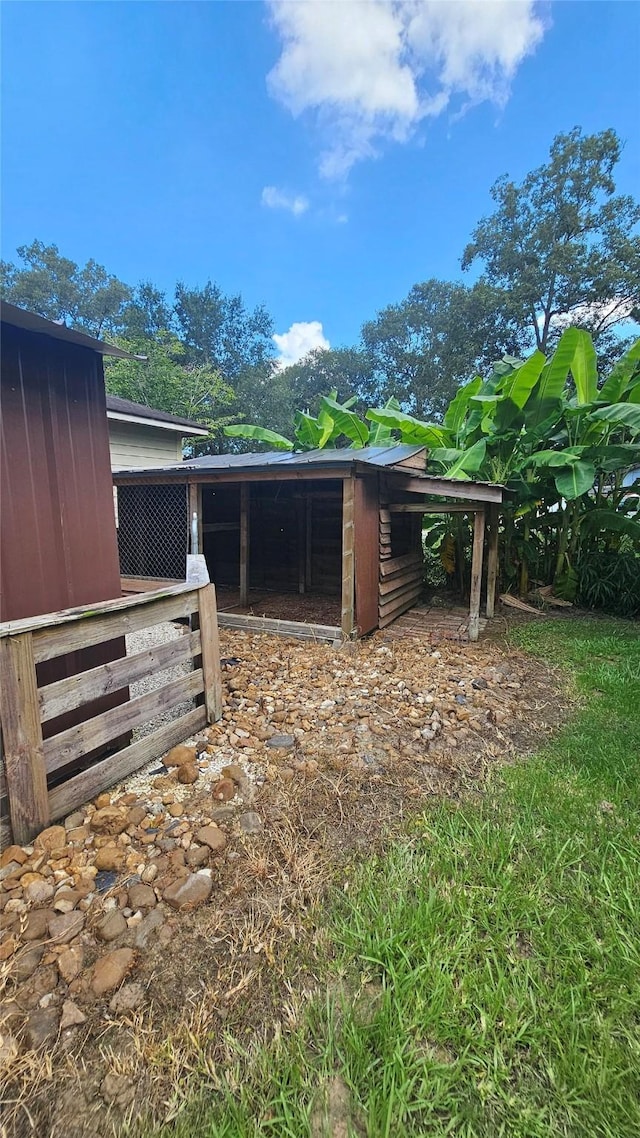 exterior space featuring an outbuilding