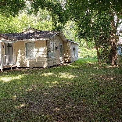 view of property exterior featuring a yard