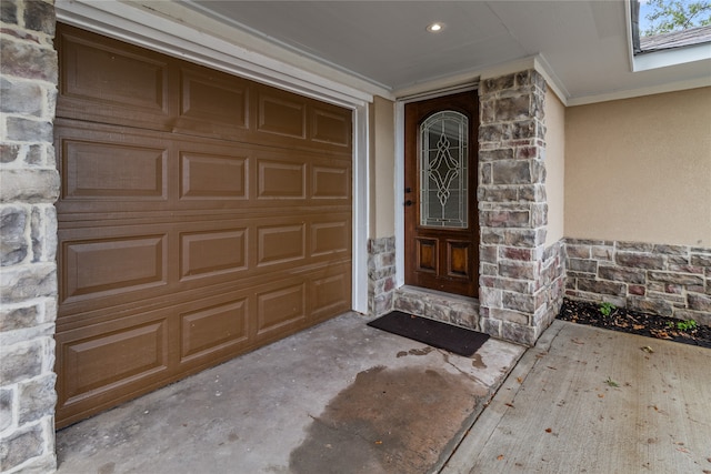 entrance to property with a garage