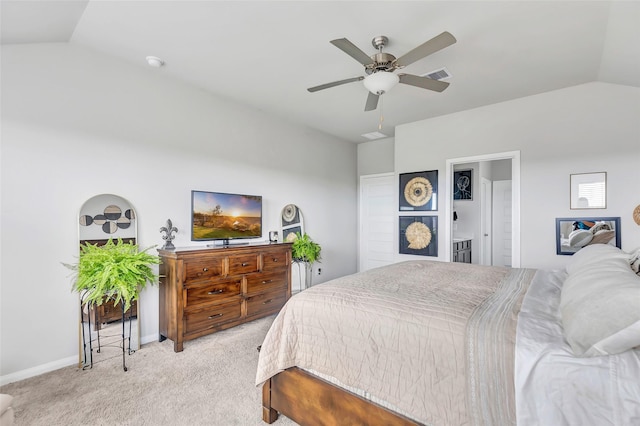 carpeted bedroom with vaulted ceiling and ceiling fan