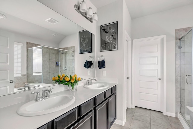 bathroom with tile patterned flooring, vanity, an enclosed shower, and lofted ceiling