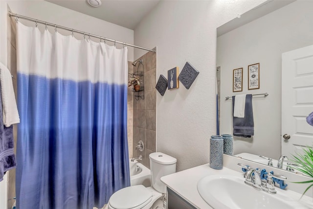 full bathroom with shower / bath combo, vanity, and toilet