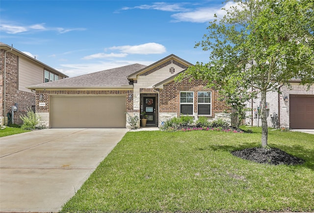 view of front of house with a garage and a front lawn