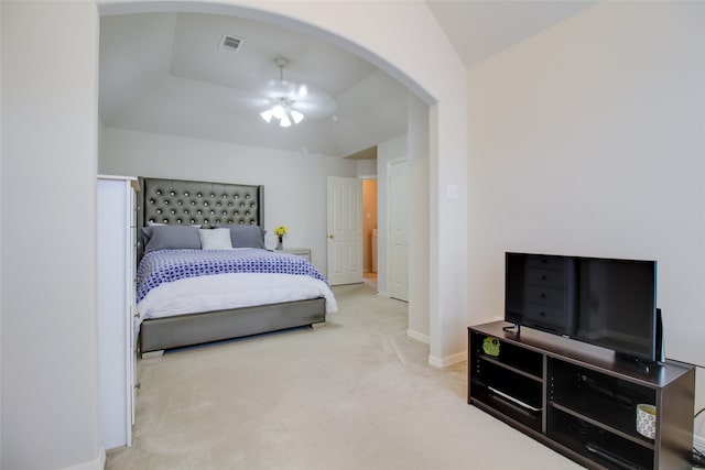 bedroom with vaulted ceiling and carpet flooring