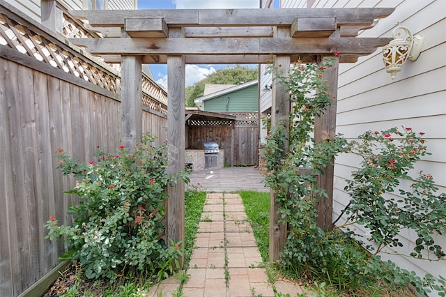 view of yard with a pergola and a patio area