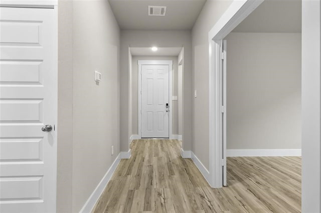 hall featuring light wood-type flooring