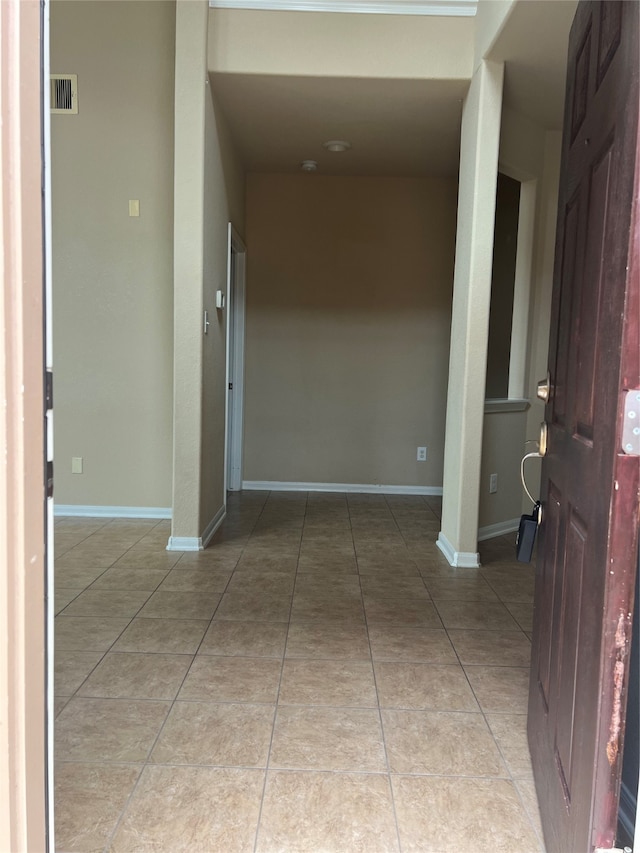 hall featuring tile patterned floors