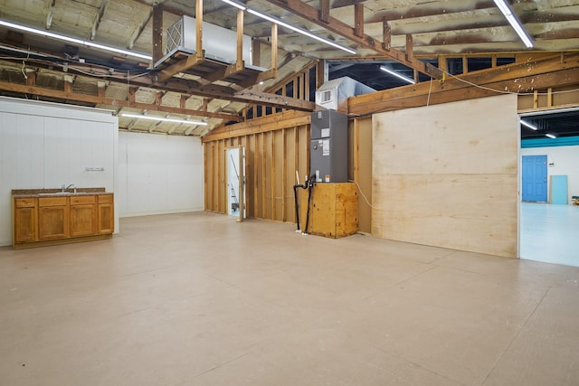 basement with sink and heating unit