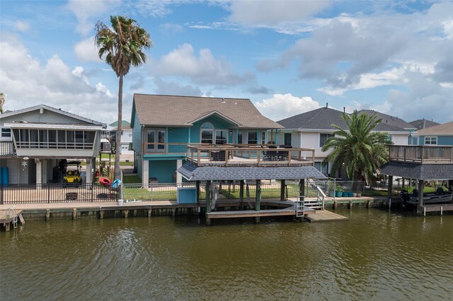 dock area with a water view