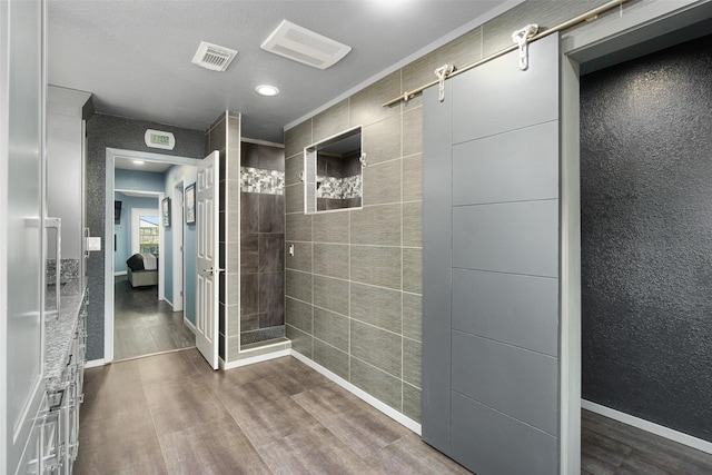 bathroom featuring hardwood / wood-style flooring