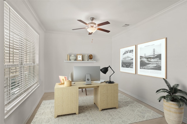 office area with a ceiling fan, baseboards, visible vents, and crown molding