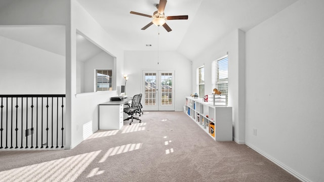 office featuring baseboards, a ceiling fan, lofted ceiling, french doors, and carpet floors