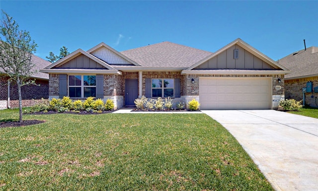 view of front of house featuring a garage and a front lawn