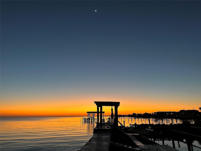 view of dock with a water view