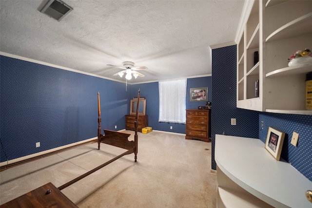 carpeted bedroom featuring crown molding, a textured ceiling, and ceiling fan