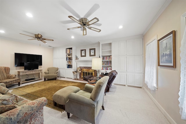 living room with light carpet, crown molding, a fireplace, and ceiling fan