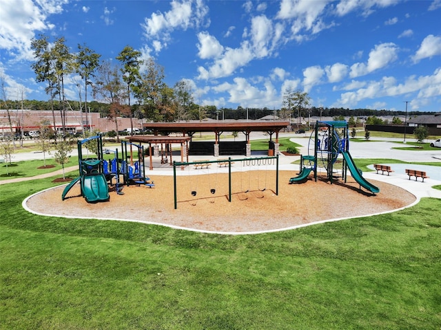 community play area with a lawn