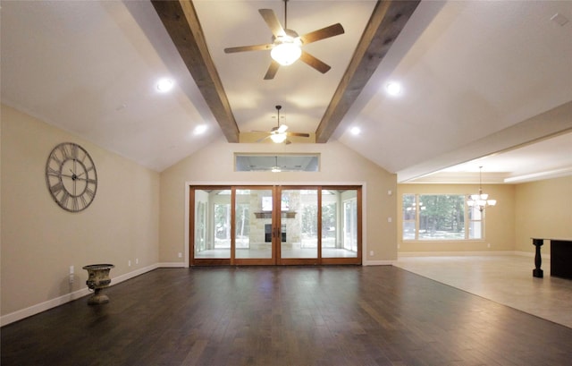 unfurnished living room with ceiling fan with notable chandelier, vaulted ceiling with beams, and dark wood-type flooring