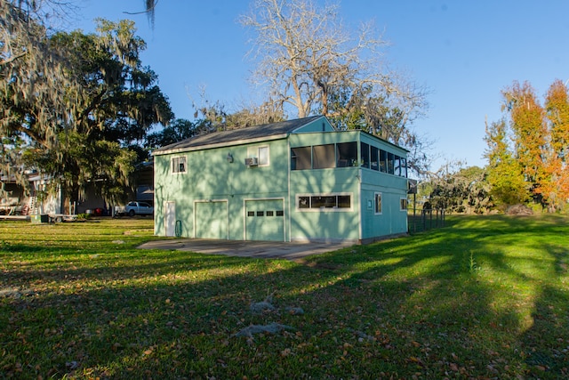 view of outbuilding with a lawn