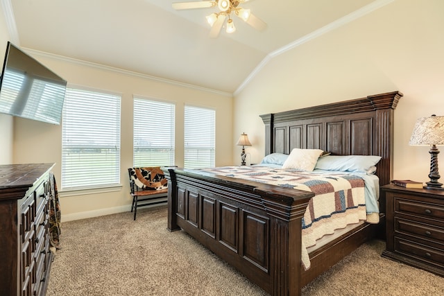 carpeted bedroom featuring lofted ceiling, ornamental molding, multiple windows, and ceiling fan