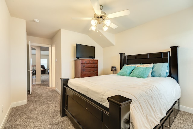 bedroom featuring light colored carpet, ceiling fan, and lofted ceiling