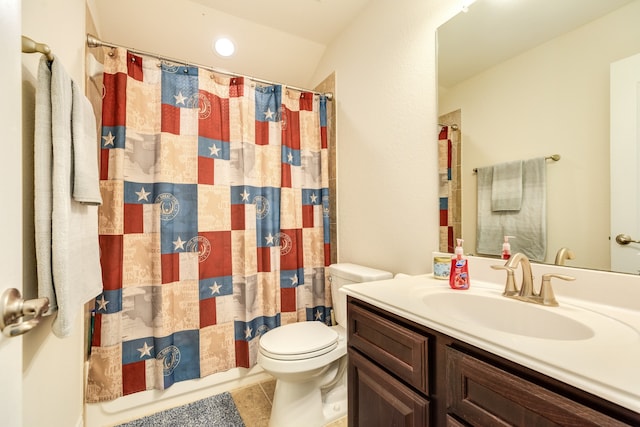 bathroom with vanity, toilet, and tile floors