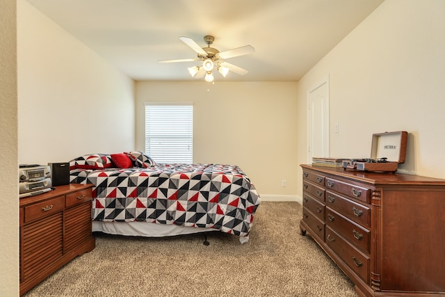 bedroom featuring carpet and ceiling fan