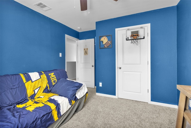 carpeted bedroom with ceiling fan