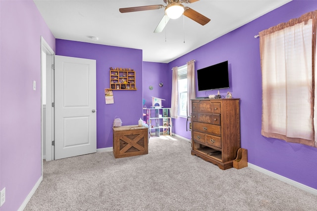 bedroom featuring ceiling fan and carpet floors