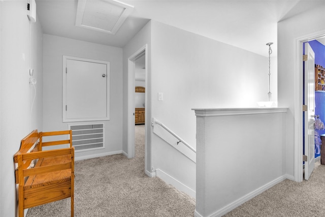 hallway with carpet flooring