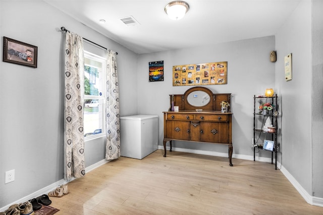 interior space with light hardwood / wood-style flooring