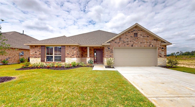 view of front of property with a garage and a front yard