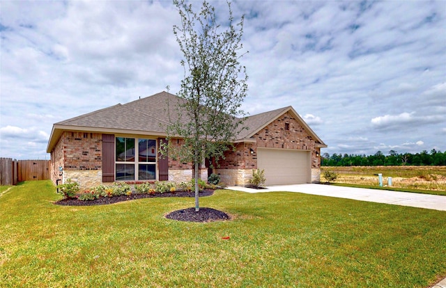 single story home with a garage and a front yard