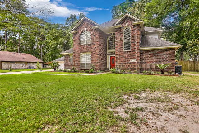 view of property featuring a front yard