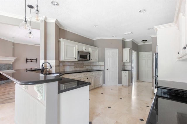 kitchen with ornamental molding, stainless steel appliances, kitchen peninsula, backsplash, and light tile floors