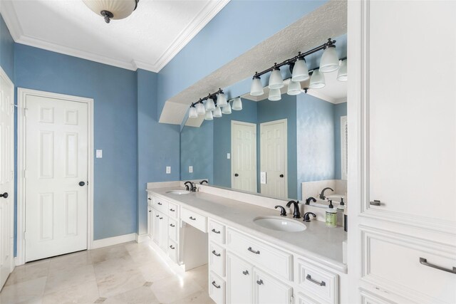 bathroom featuring crown molding, tile flooring, double sink vanity, and a textured ceiling