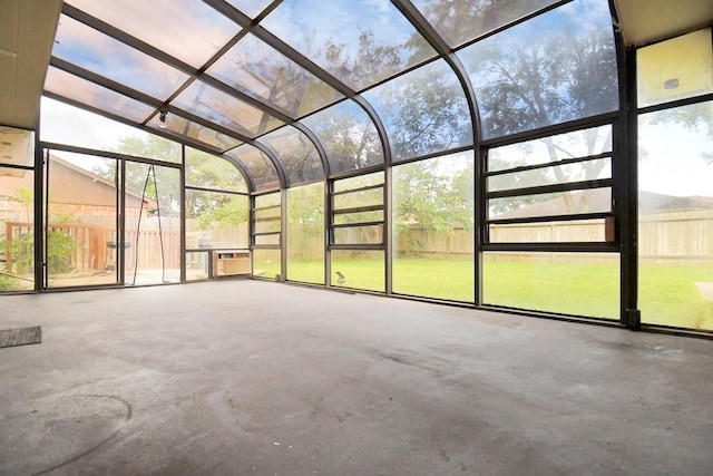 unfurnished sunroom with a wealth of natural light